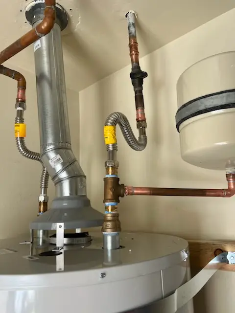 Water heater installation and plumbing repair in Somerville